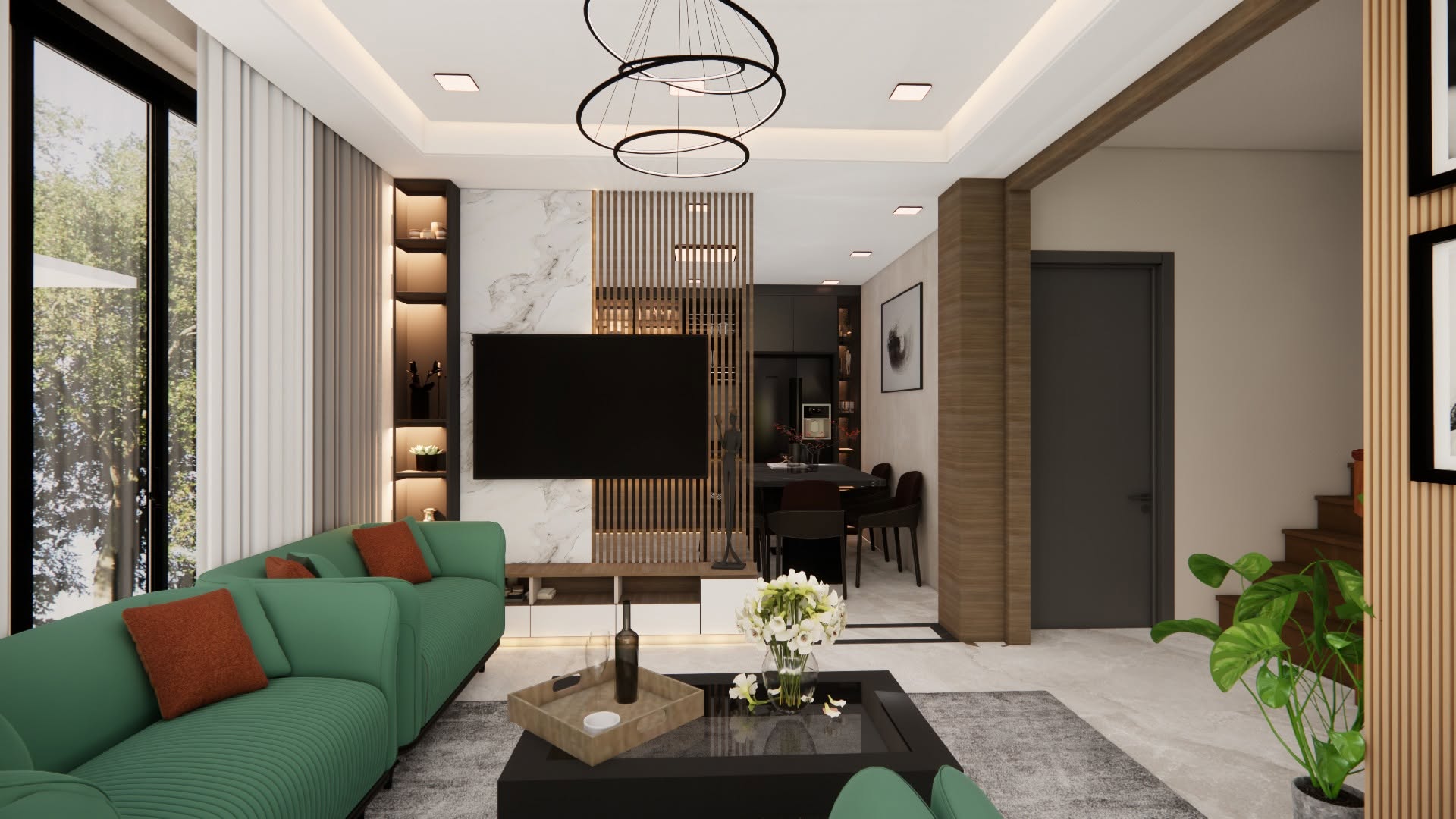 Contemporary living and dining room with green sofa